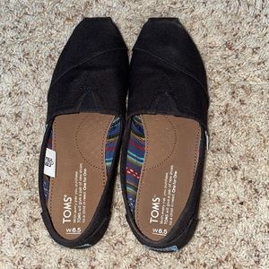 Gently worn black Toms